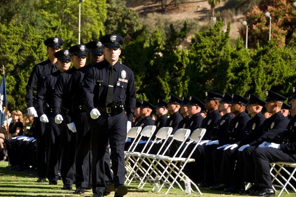 Graduating officers standing in formation at a ceremony